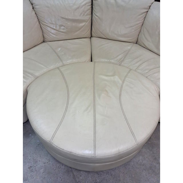 Corner Sofa in Cream Leather with Ottoman, 1970s, in Good conditions. Designed 1970 to 1979