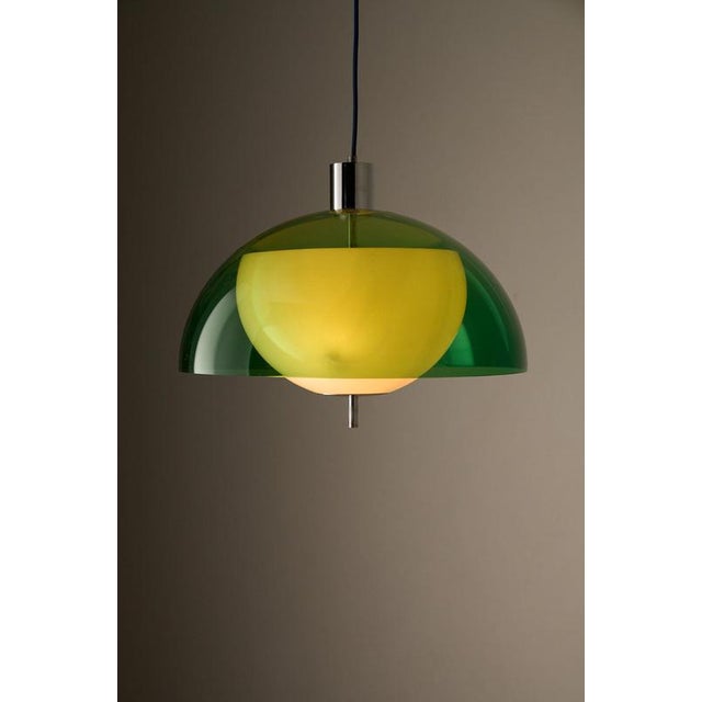 Pendant light from the 1970s, that captures the playful, optimistic spirit of the Space Age era. The lamp features a 44 cm...