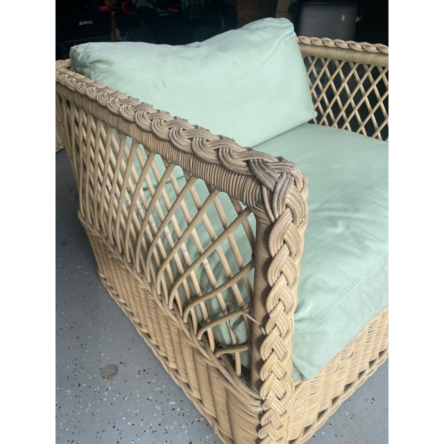 Rare authentic vintage McGuire San Francisco matching sofa and lounge chair set. This exceptional set features the...