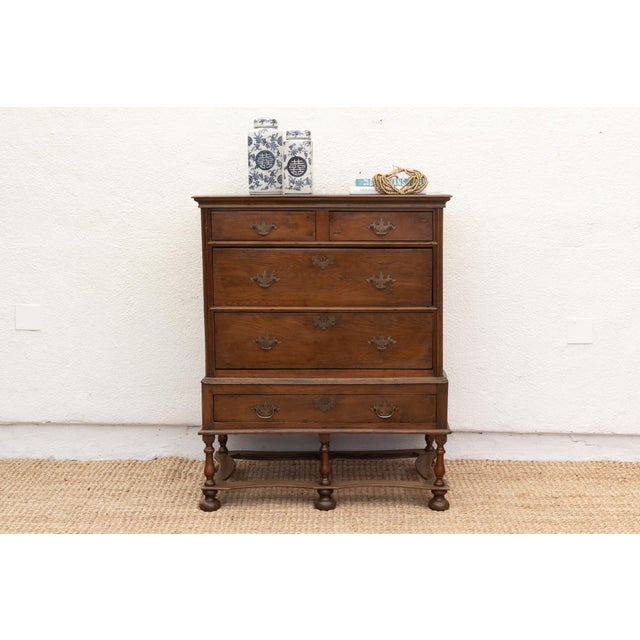 Add a touch of 18th-century English elegance to your bedroom with this highboy dresser. Measuring 38 inches wide, 21...