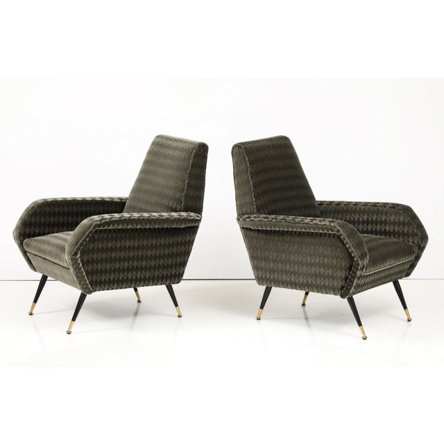 Beautiful pair of 1950's mid-century modern Italian lounge chairs in the style of Marco Zanuso, fully restored and re-...