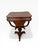 A beautifully crafted Federal-style sewing or work table, featuring rich mahogany veneers and delicate contrasting wood...