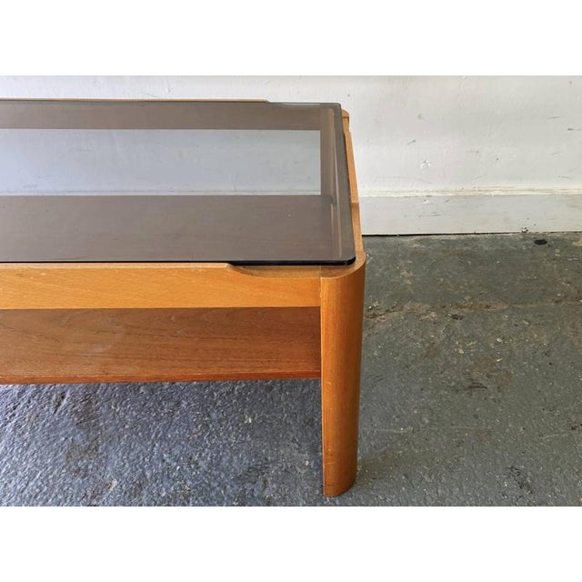 This is a Mid-Century modern coffee table by Myer, a well-regarded English manufacturer known for producing quality teak...