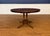 This is an oval mahogany table made in the Leighton Hall shop in Suwanee, Georgia. It features a field of radial cut...