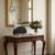Hand Forged Iron Newspaper & Magazine Rack (54cm) Antique Gold Scroll Design with Arched Handle For Sale - Image 4 of 10