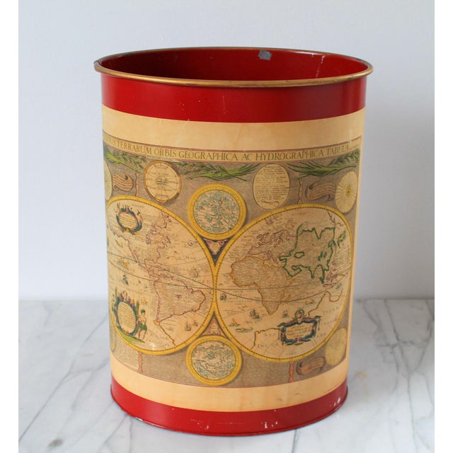 Vintage Keller Charles of Philadelphia red metal waste basket with world maps on the front. Makers mark on bottom. Age...