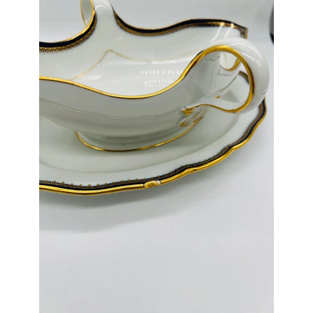 Meissen Porcelain Cobalt & Gold Rim Decorated Sauce Boat with attached under plate. Marked to underside. Please note I...