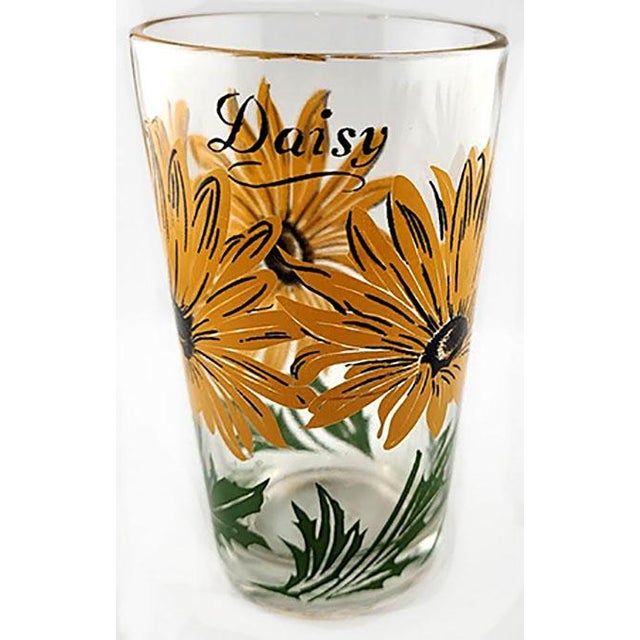 Bring a cheerful pop of mid-century Americana to your bar cart or tabletop with this matching set of eight vintage Boscul...