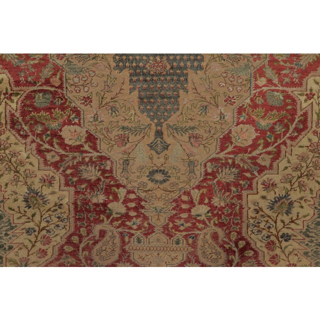 Hand-knotted in natural silk circa 1920-1929, this rare 4x6 antique Turkish rug is a masterpiece of design. It highlights...