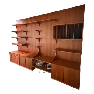 Authentic 4-Bay Cado Royal System Wall Unit in Teak by Poul Cadovius C. 1962​ This Set Is a Collector’s Dream. For Sale