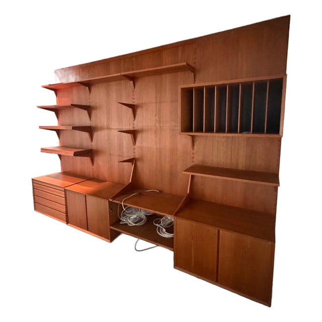Authentic 4-Bay Cado Royal System Wall Unit in Teak by Poul Cadovius C. 1962​ This Set Is a Collector’s Dream. For Sale