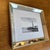 Design Plus Gallery presents an Eiffel Tower Photograph in a Beveled Mirror Frame. The photo is in black and white with...