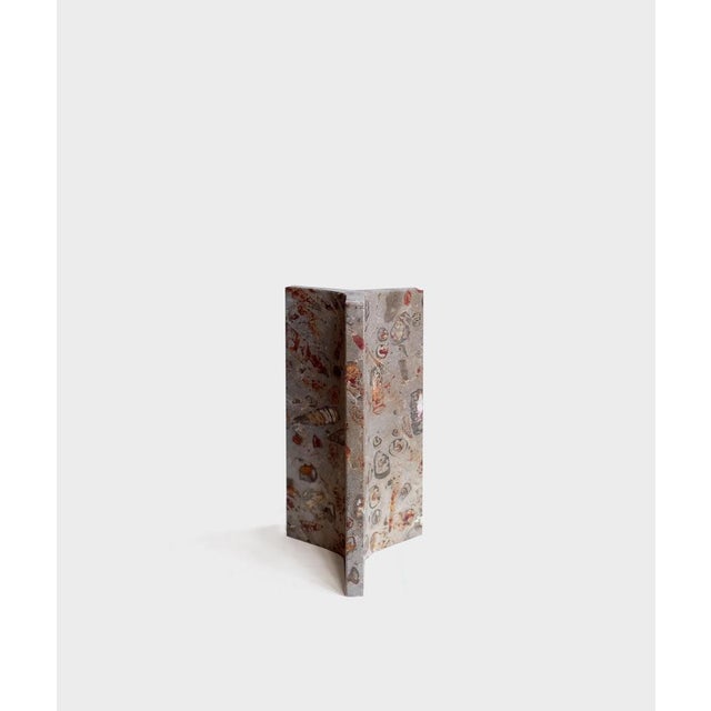 Cariátide small series, 24cm sculpture in jurassic fossil stone by nerinea. Dimensions: w 11 x d 12 x h 24 cm. Materials:...