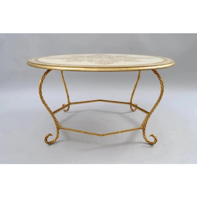 Vintage Italian Florentine Hollywood Regency Gold Wood & Iron Rope Round Coffee Table. Item features a a round wooden top...