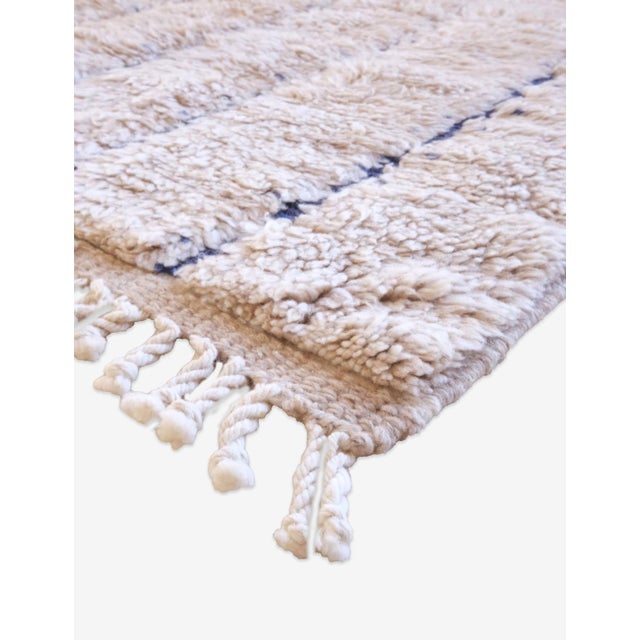 Modern Beni Mrirt Rug – Handwoven Moroccan Wool with Minimal Line Design This modern Beni Mrirt rug is custom made and...