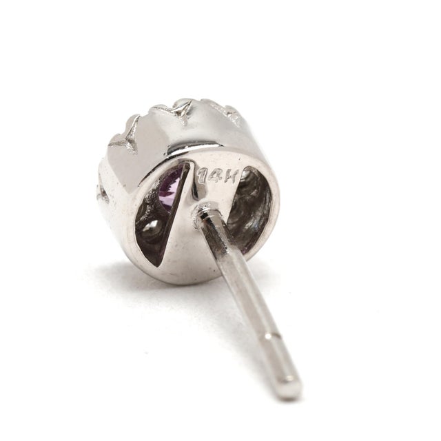 Stones: pink sapphires, 2 stones round cut 3 mm approximately .25 total carats diamonds, 18 stones round brilliant cut 1...