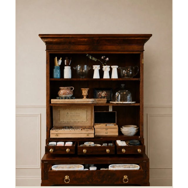 This item is a antique American Empire flame mahogany secretary desk and bookcase, dating from approximately 1830's to...