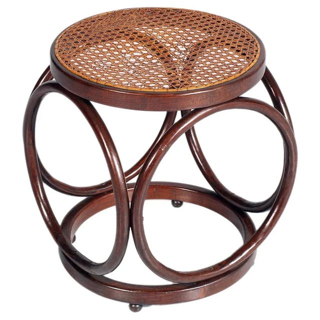 A original art deco Bentwood Stool or Table with Rattan Cane Top designed by Michael Thonet, with 4 spherical feet. Wax...