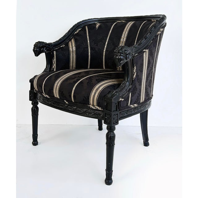 Vintage Ebonized Carved Ram's Head Bergère Chairs, Pair Offered for sale is a pair of ebonized carved wood Bergère chairs...