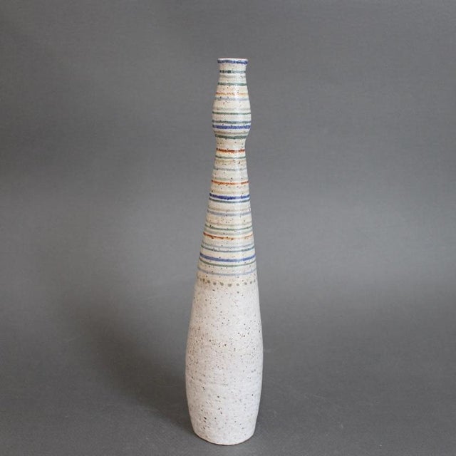 Vintage Italian ceramic bottle / single-flower vase by Bruno Gambone (circa 1970s), of a slender, elongated silhouette...