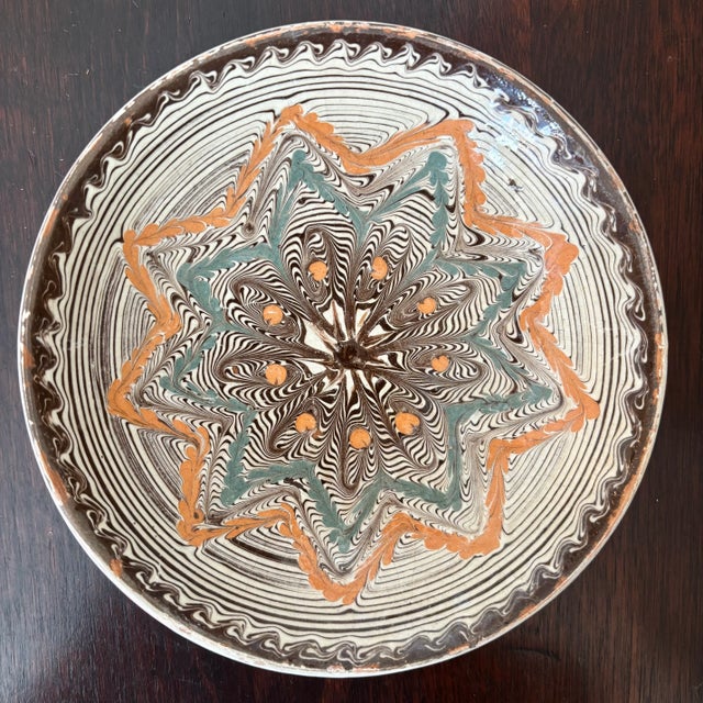 Offering a beautiful traditional Horezu decorative plate from Romania (circa mid-/late-20th century). A traditional...