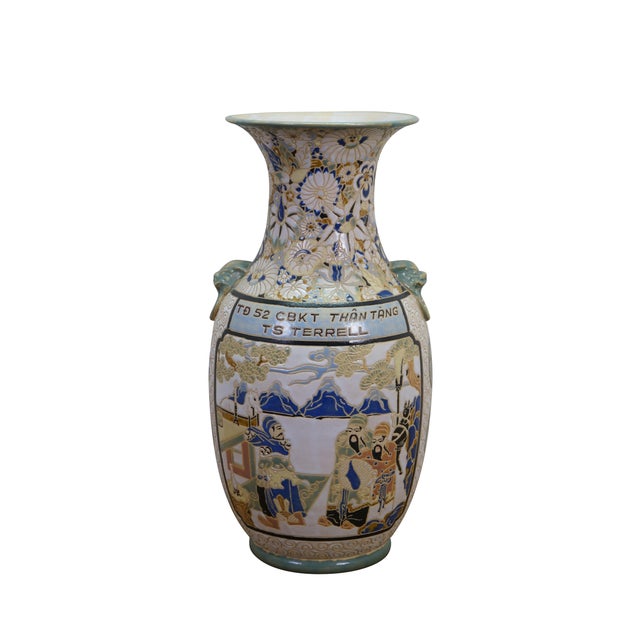 Vintage Japanese Satsuma style mantel vase or urn featuring a chinoiserie mountain landscape scene with wise men, horses,...