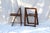 Pair of Midcentury modern folding chairs in a darker stained wood. Aged brass hardware. Stamped on the back. Made in...