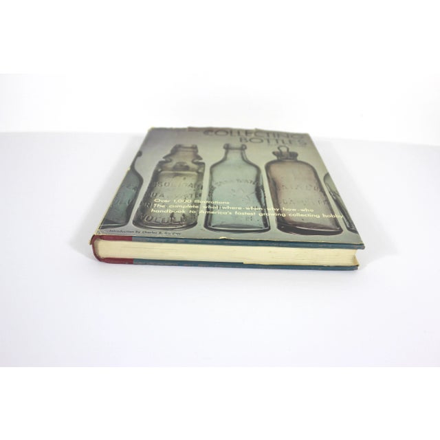 1970 Illustrated Guide to Collecting Bottles hardcover book. This is great for bookshelf of coffee table styling. The book...