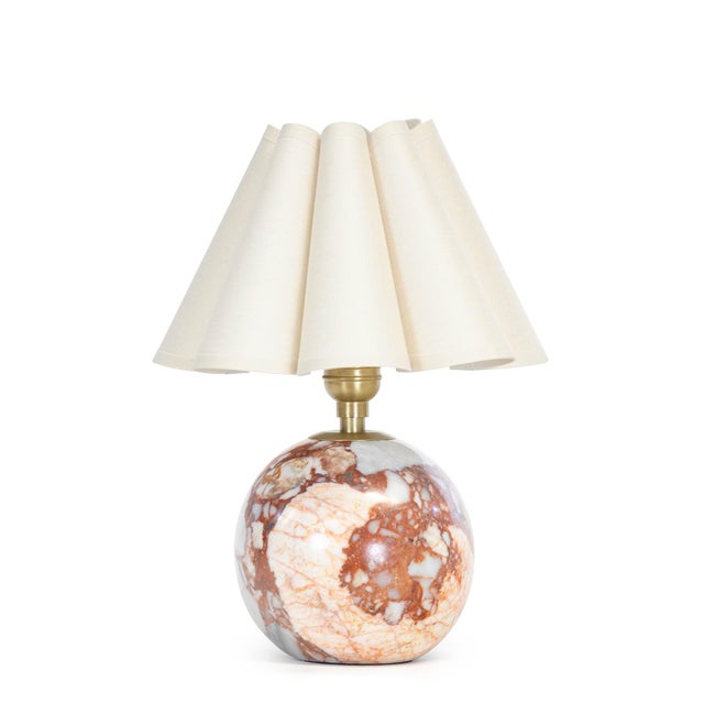 Richly veined natural marble forms the foundation of the Giorgio Mini Table Lamp, bringing depth and character to its...
