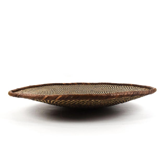 Tonga Binga baskets are traditional handcrafted baskets made by the Tonga women of Binga district in Zimbabwe. Crafted...