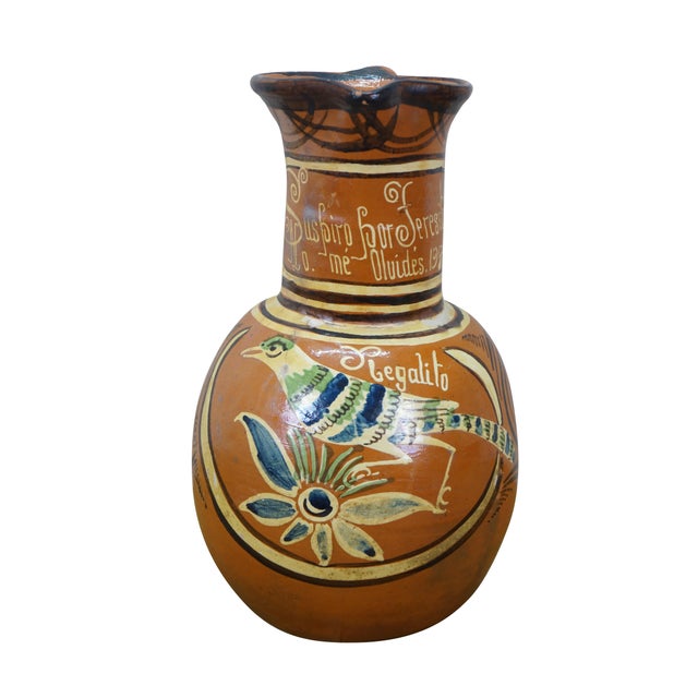 Vintage 1976 Mexican folk art pottery pulque / water pitcher. Orange earthenware ceramic with hand painted design...