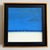 This minimalist blue horizon beach scene oil on canvas features expansive bands of sky, sea, and sand, punctuated by...