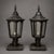 This striking set of 20th Century English Iron Lanterns brings timeless European character and architectural charm to both...