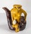We are selling this cool Chinese early 20th century teapot. This teapot has great form with a monkey and smaller monkey...