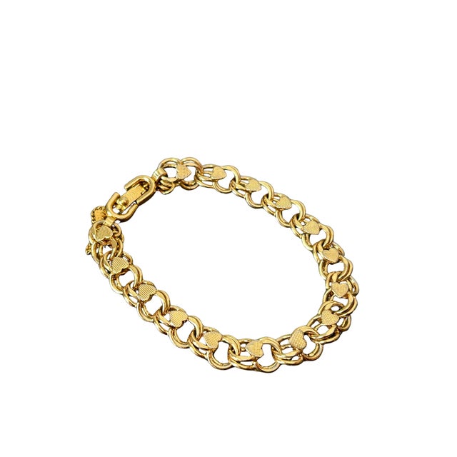 Vintage Monet Signed Gold-Tone Textured Heart and Link Bracelet | Mid-Century Designer Costume Jewelry This elegant...