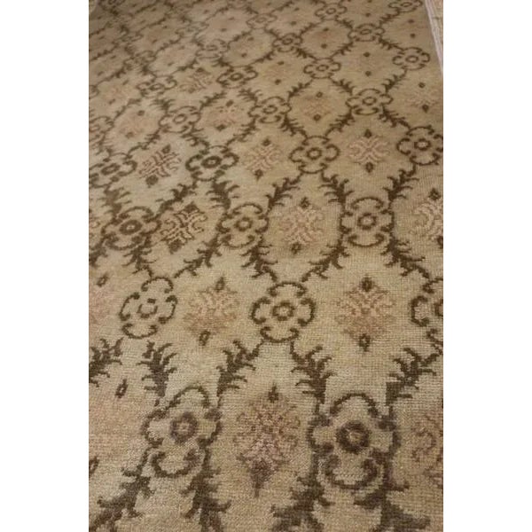 Handmade in flat woven wool originating circa 1950-1960, this vintage Kilim rug is a transitional piece that is notably...