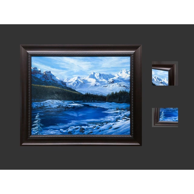 In "Winter's Call," a serene winter landscape unfolds, featuring majestic snow-capped mountains that rise dramatically...
