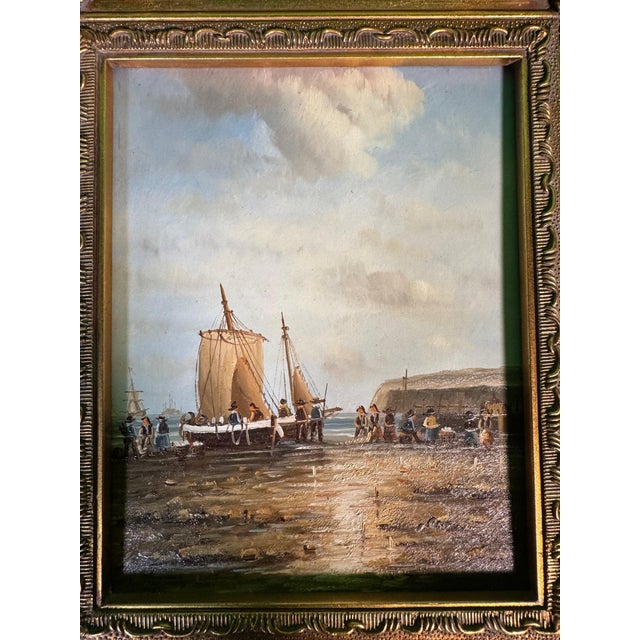 Original oil on panel of a two-masted fishing vessel beached on a wet foreshore, with figures in 17th/18th-century-style...