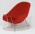 Experience unparalleled comfort and design with Eero Saarinen's iconic Womb Chair with Ottoman. This 20th-century...