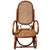 Turn of the century Vienna Secession oak child size rocking chair features an elegant, sculptural frame crafted from warm-...