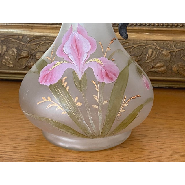 Antique and charming enameled glass ewer/pitcher/carafe with a hand-painted floral design of pink irises and a pewter...