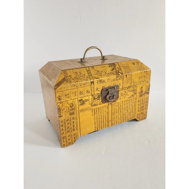 Antique early 20th century Chinese lacquered wooden footed box featuring calligraphy and scenic decorations (maybe taken...