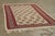 Handwoven in wool, a 3x5 antique Senneh Kilim rug originating circa 1930-1940. The beautiful piece showcases a brilliant...
