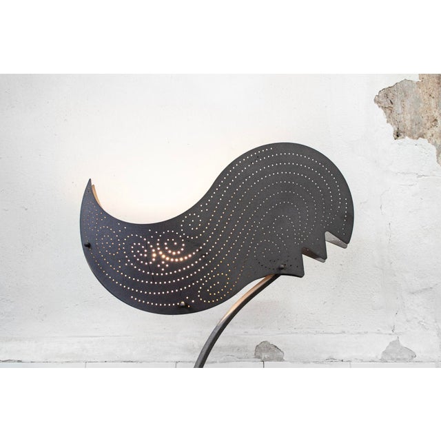 Metal floor lamp. Zefiro model Designer: Riccardo Dalisi Manufacturer: Oluce Year: 1992 This piece has an attribution...