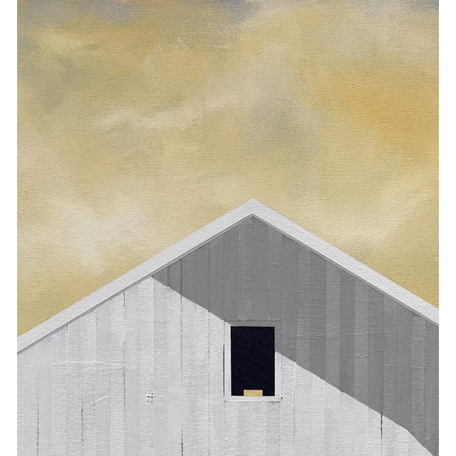 Summer Sunset by Justin Wheatley is an acrylic painting on panel of a white barn standing against a warm yellow sky....