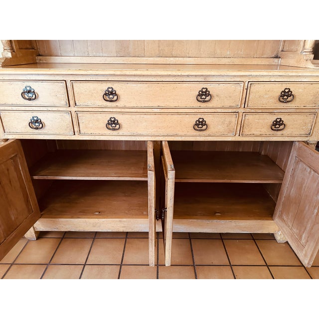 Bausman & Company Sideboard with top hutch. Beautiful piece with 6 drawers with 2 side pull out shelves and 4 door cabinet...