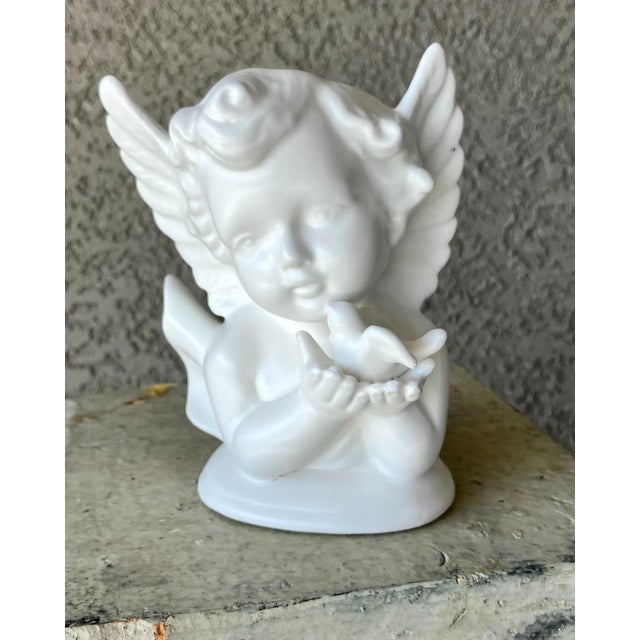 Excellent Pre-Owned Condition. This mid 20th-century cutie was handcrafted from bisque porcelain, which is unglazed, off...