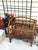 This vintage, arched, rattan/bamboo magazine/book rack, contains dual compartments, and is quite pleasing to the eye! It...