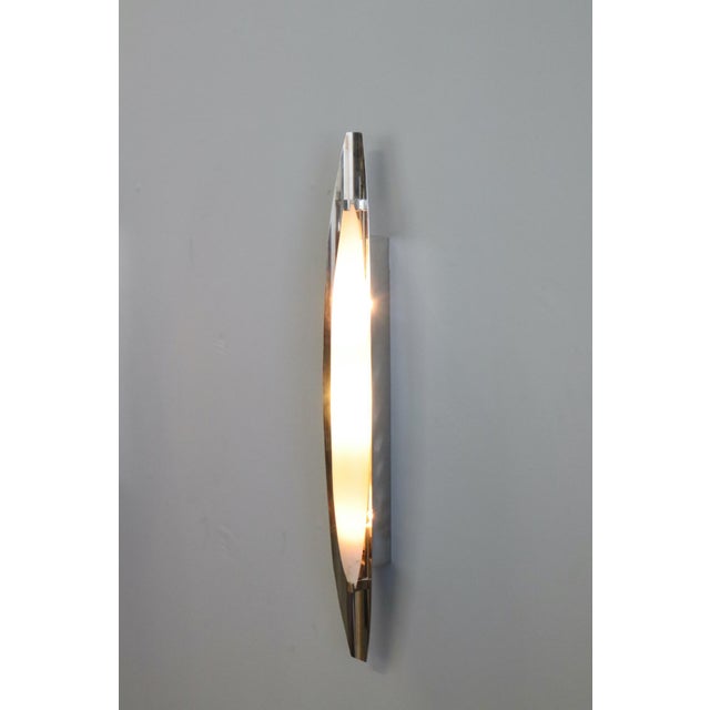 Curved satin-finish white glass diffuser, brushed nickel-plated brass body. from the 1950s/1960s, in excellent original...