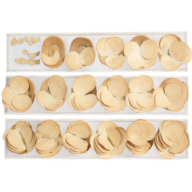 A signed assemblage triptych wall sculpture by the American artist James Spencer Russell (1915-2000). Signed "James...